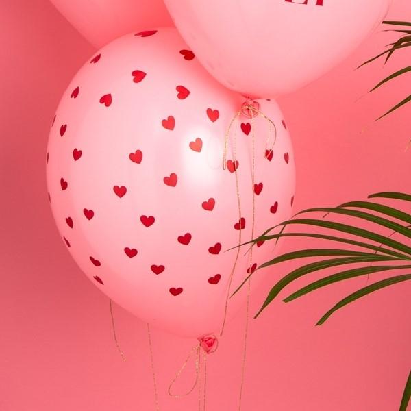 Luftballon rosa mit roten Herzchen